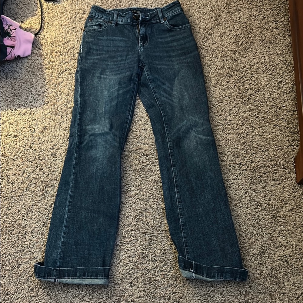 Blue Boot Cut Jeans with Distressed Details